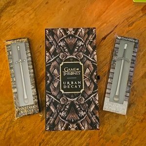 Urban Decay Game of Thrones Palette and Sword eyeshadow brushes.